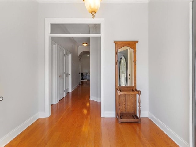 corridor featuring hardwood / wood-style flooring