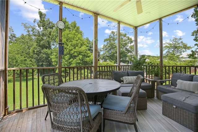 sunroom / solarium with ceiling fan