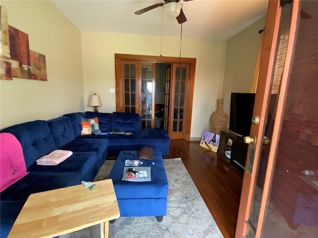 living room featuring ceiling fan, hardwood / wood-style flooring, and french doors