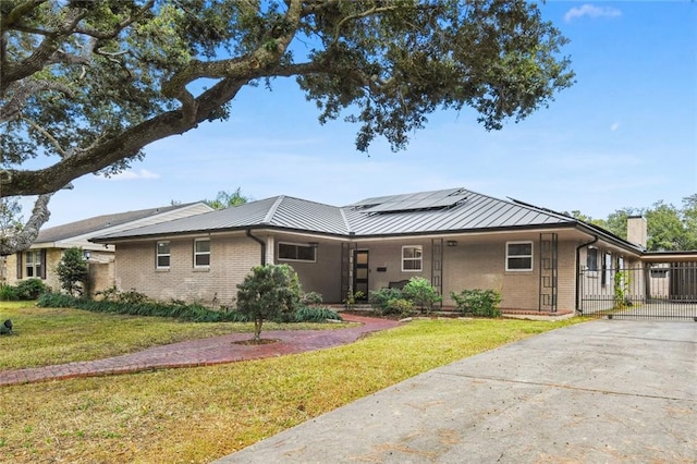 view of front of property with a front lawn