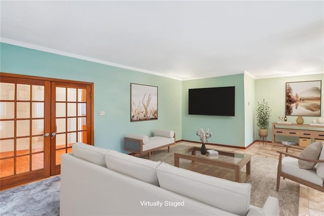 living room with crown molding and french doors