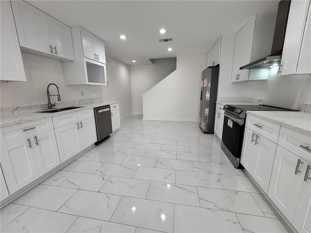 kitchen with visible vents, marble finish floor, range with electric cooktop, and freestanding refrigerator