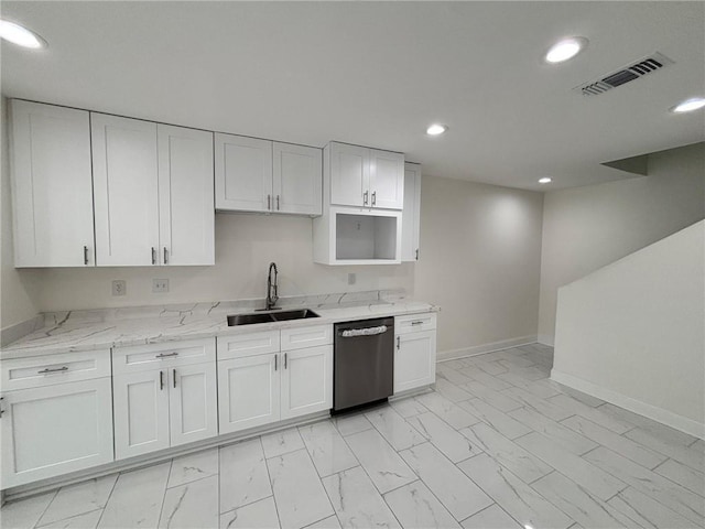 kitchen featuring recessed lighting, visible vents, white cabinets, a sink, and dishwasher