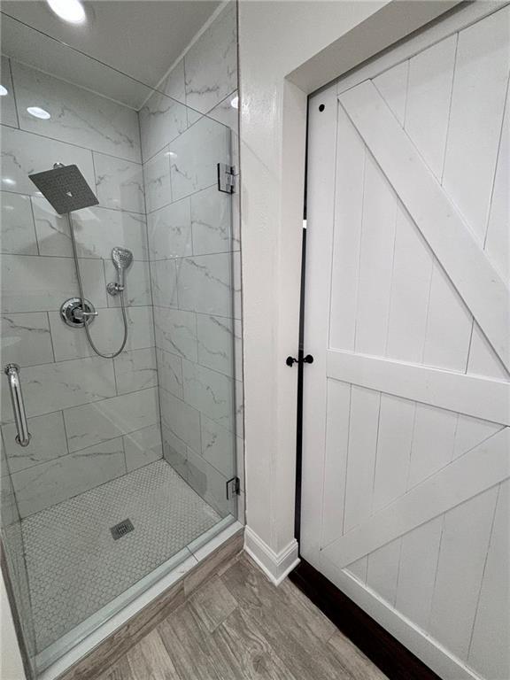 bathroom with a stall shower