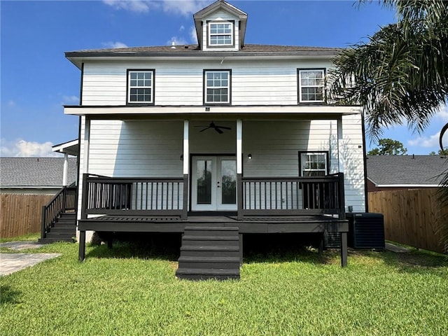 back of house featuring french doors, a lawn, central AC, ceiling fan, and fence