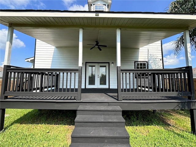 entrance to property featuring french doors and ceiling fan