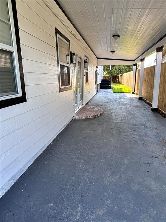 view of patio / terrace with fence