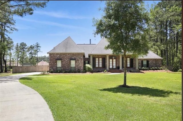 view of front of home with a front yard