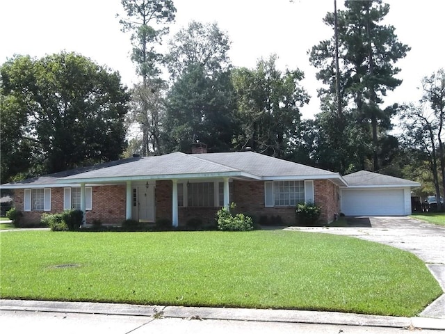 ranch-style house with a front yard and a garage