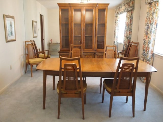 view of carpeted dining area