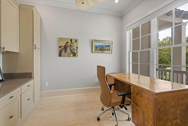 home office with crown molding and light wood-type flooring