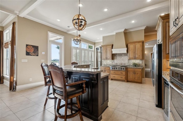 kitchen with a kitchen bar, decorative backsplash, custom range hood, and light tile patterned flooring