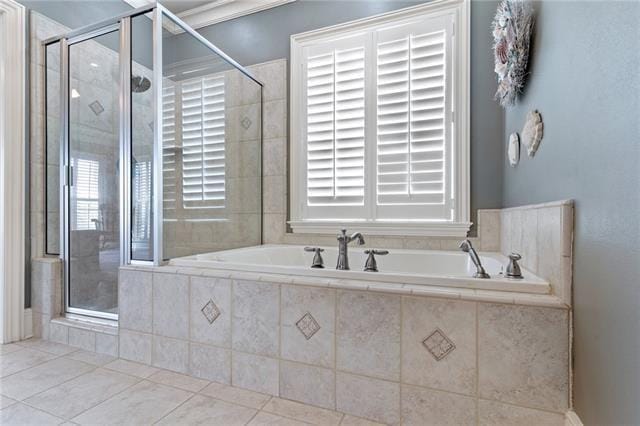 bathroom with plus walk in shower and tile patterned floors