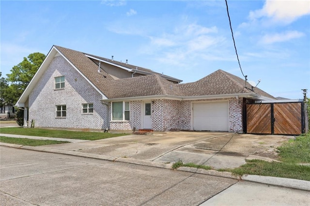 view of front of home with a garage