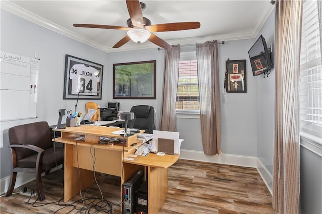 home office featuring ceiling fan, crown molding, baseboards, and wood finished floors