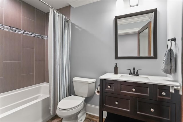 full bathroom with baseboards, vanity, toilet, and shower / tub combo with curtain