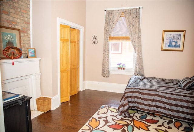 bedroom featuring dark wood-type flooring