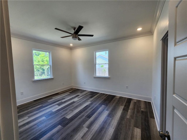 empty room featuring ceiling fan, dark hardwood / wood-style floors, and ornamental molding