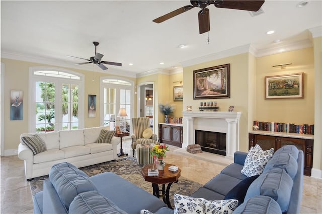 living room featuring ceiling fan, french doors, and ornamental molding