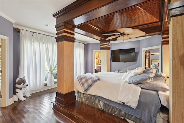 bedroom with ceiling fan, beam ceiling, ornamental molding, and dark wood-type flooring