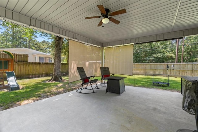 view of patio with ceiling fan