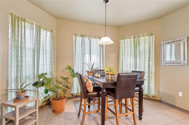 view of tiled dining space