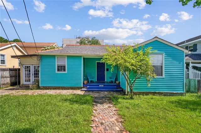 view of front of property with a front lawn