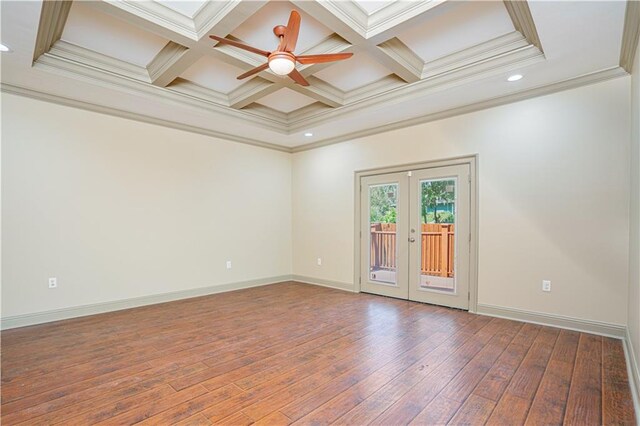 empty room with hardwood / wood-style floors, coffered ceiling, french doors, and ceiling fan