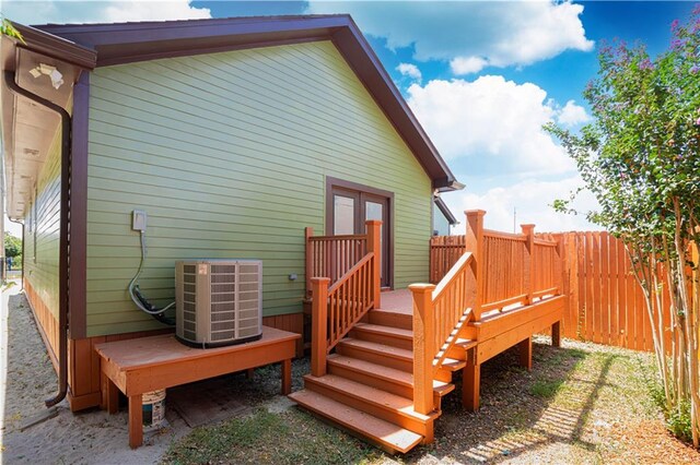 wooden terrace featuring central AC