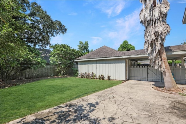 view of side of home featuring a lawn