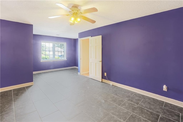 tiled empty room with ceiling fan