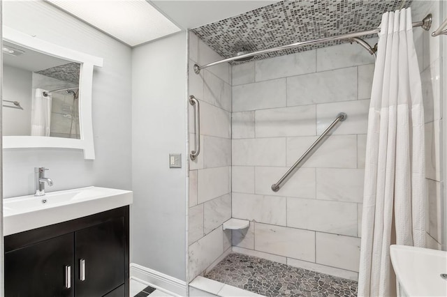 bathroom with vanity and a shower with shower curtain