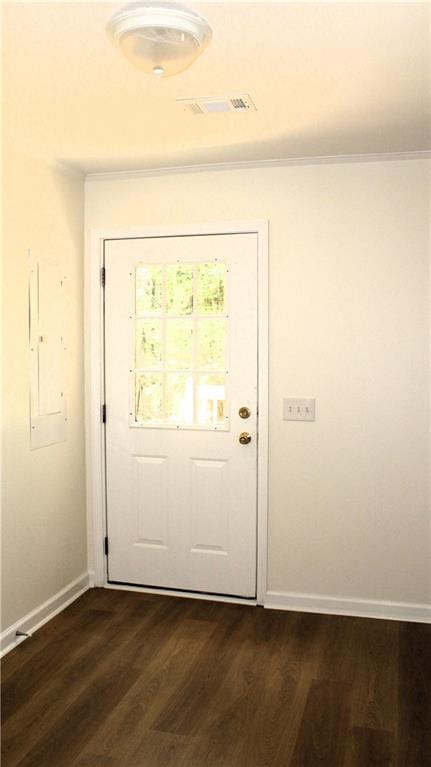 doorway with dark wood-type flooring