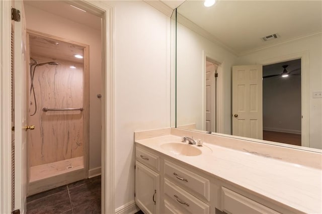 bathroom with walk in shower, vanity, tile patterned floors, and ornamental molding