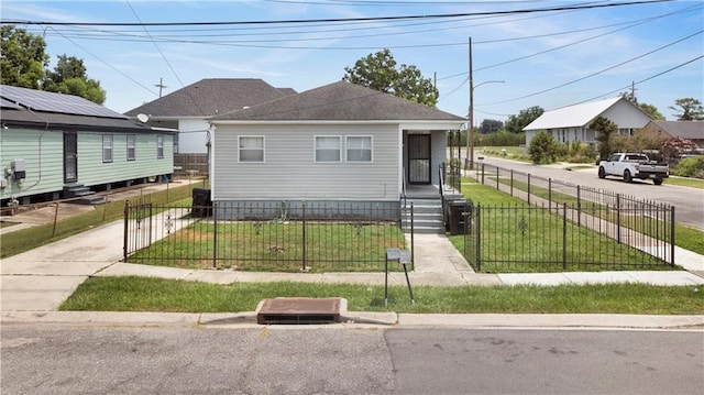 bungalow with a front lawn