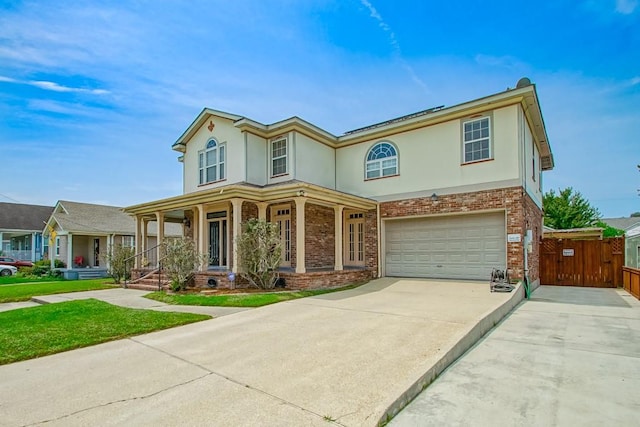 view of front of home with a garage and covered porch