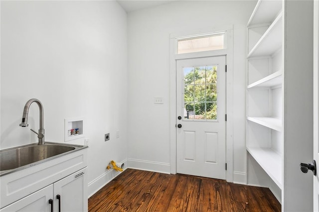 laundry area with dark hardwood / wood-style flooring, electric dryer hookup, washer hookup, cabinets, and sink