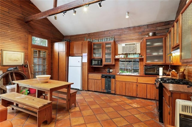 kitchen featuring beamed ceiling, sink, rail lighting, high vaulted ceiling, and black appliances