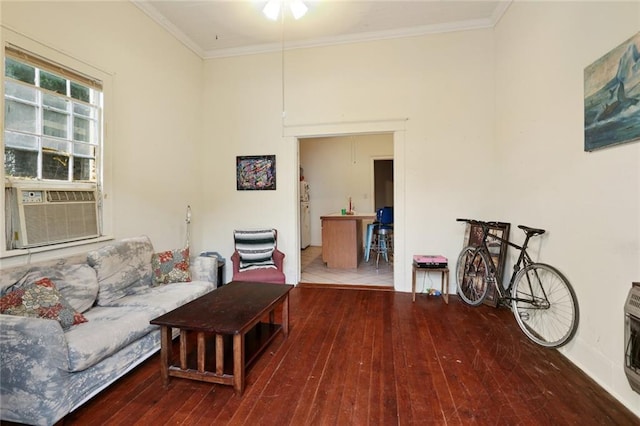 living room with wood-type flooring, crown molding, ceiling fan, and cooling unit