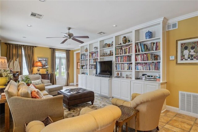 living room featuring ceiling fan and light tile patterned floors