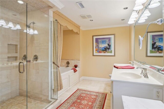 bathroom with tile patterned flooring, crown molding, separate shower and tub, and vanity