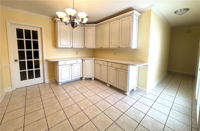 kitchen featuring a notable chandelier, crown molding, pendant lighting, and light tile patterned floors