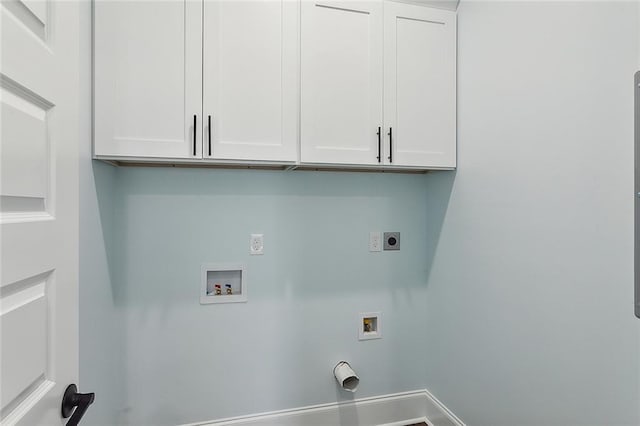 laundry area with electric dryer hookup, cabinets, and hookup for a washing machine