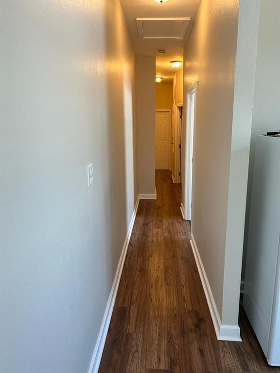 201214 Congress St, New Orleans, LA 70117 - hallway with baseboards, attic access, and dark wood finished floors