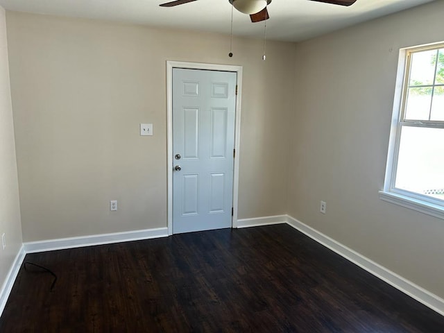 empty room featuring ceiling fan and wood-type flooring