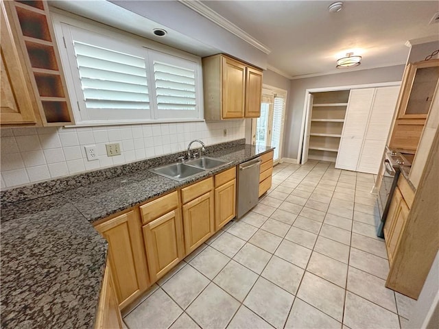 kitchen featuring tasteful backsplash, appliances with stainless steel finishes, sink, crown molding, and light tile patterned flooring