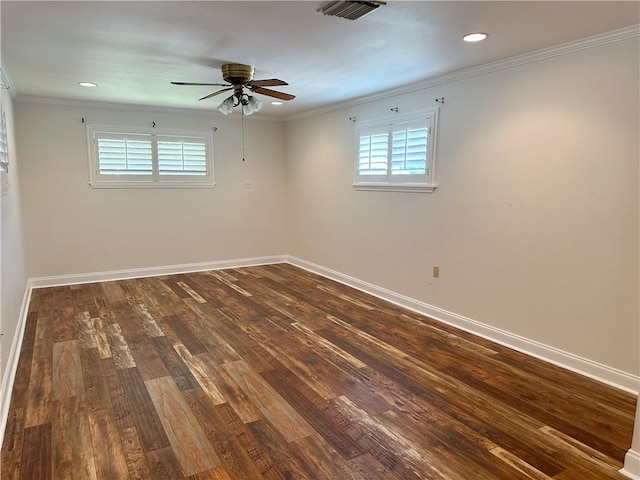 empty room with ceiling fan, ornamental molding, and hardwood / wood-style flooring