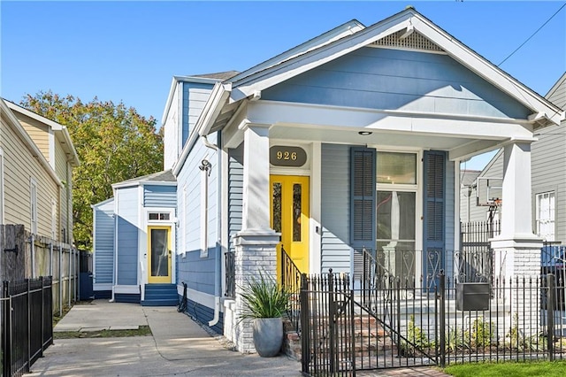 bungalow featuring covered porch