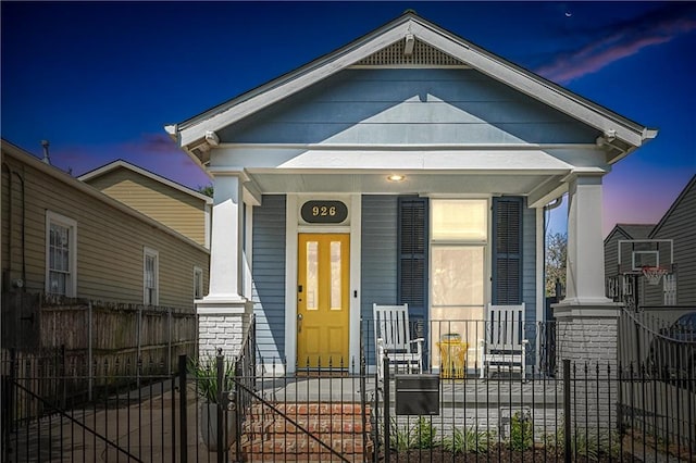 view of front of house with covered porch