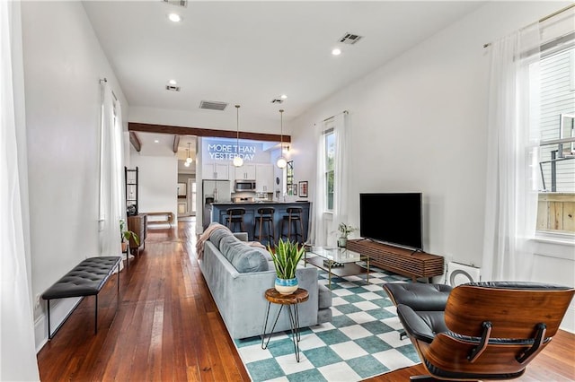 living room with wood-type flooring